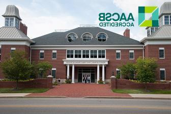 exterior photo of COBE with AACSB logo overlay